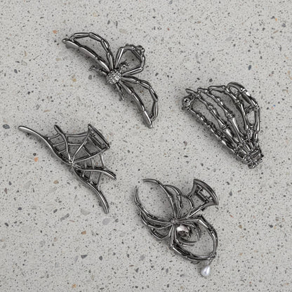 Set Halloween-haarclips met spinnen en vleermuizen voor feestelijke kostuumstyling